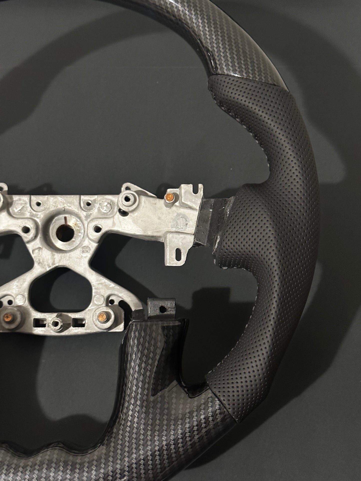 Nissan Y-62 (2018-2022) carbon fibre style steering wheel